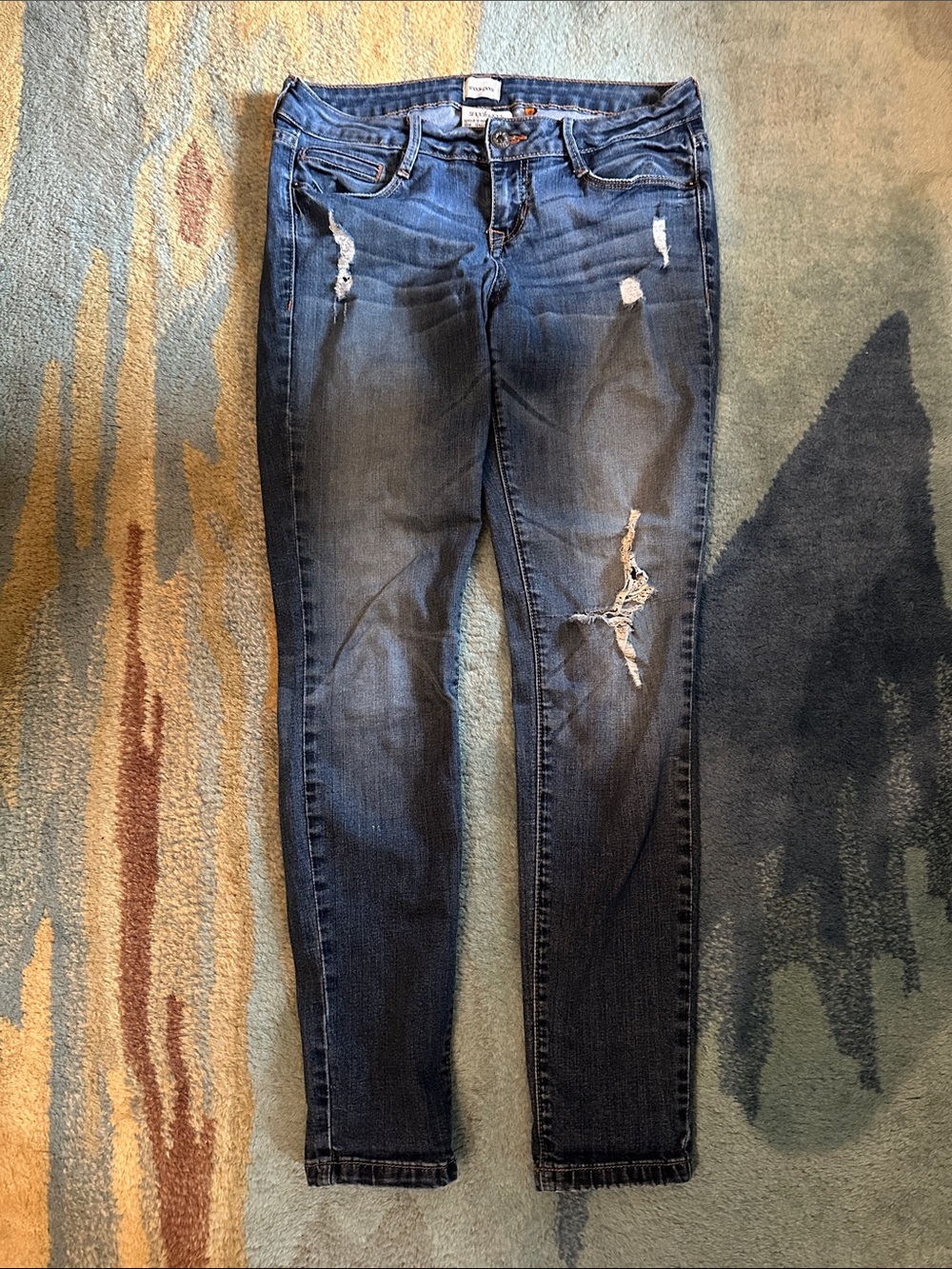 Sneak Peek Distressed Dark Blue Skinny Jeans
